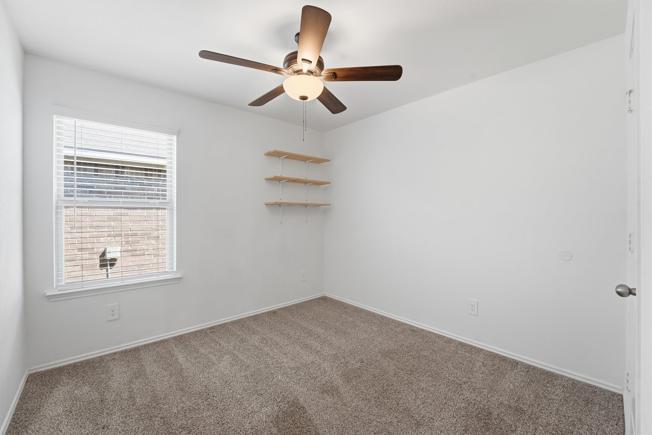 2419 Roaming Elk Court Spring, TX 77373 - Photo 2 of 3 an empty room with a window
