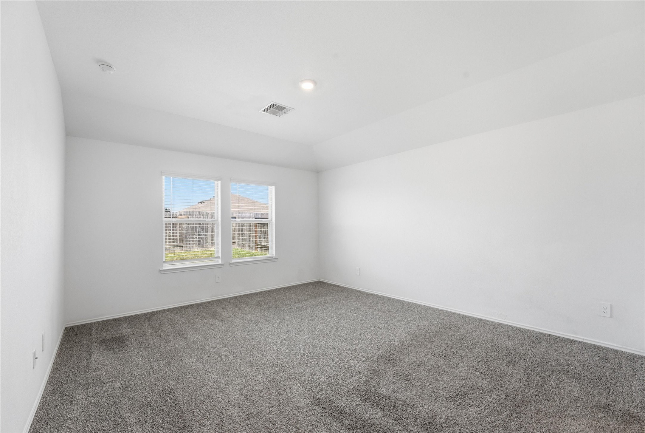 2419 Roaming Elk Court Spring, TX 77373 - Photo 3 of 3 an empty room with a window