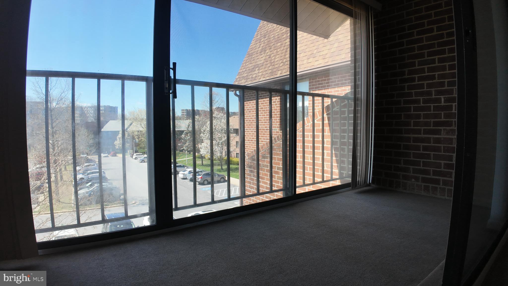 15311 Beaverbrook Court, Unit 903B Silver Spring, MD 20906 - Photo 13 of 36 a view of a large window with an outdoor view
