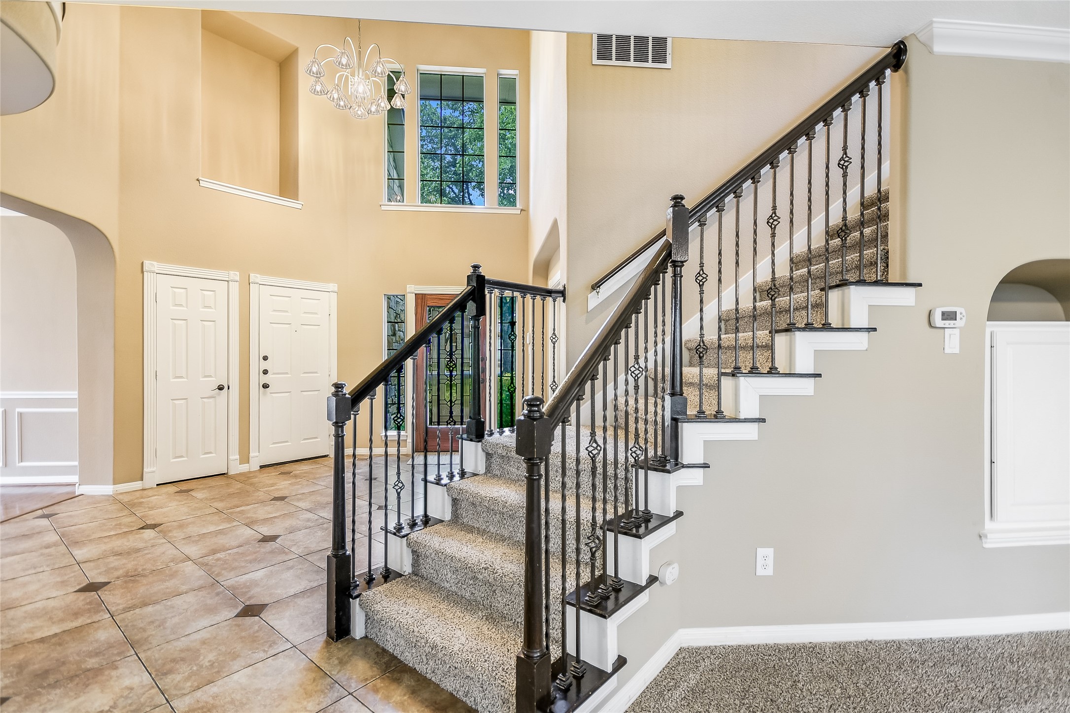 12935 Brigham Drive Austin, TX 78732 - Photo 12 of 35 Dramatic Foyer with two story tall ceilings