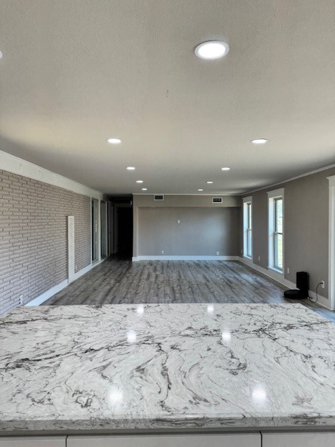 3500 Doris Street Bay City, TX 77414 - Photo 11 of 22 a view of a hall with wooden floor