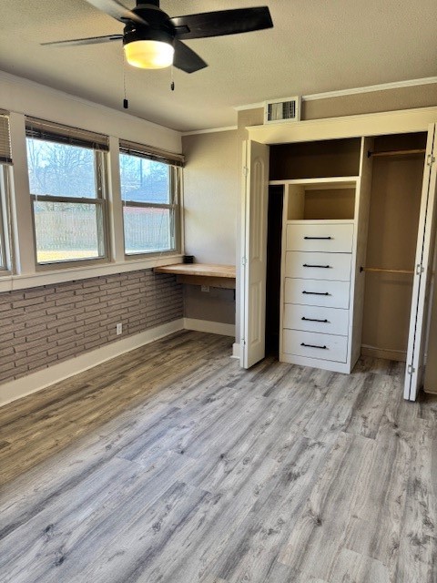 3500 Doris Street Bay City, TX 77414 - Photo 16 of 22 wooden floor and windows in a room