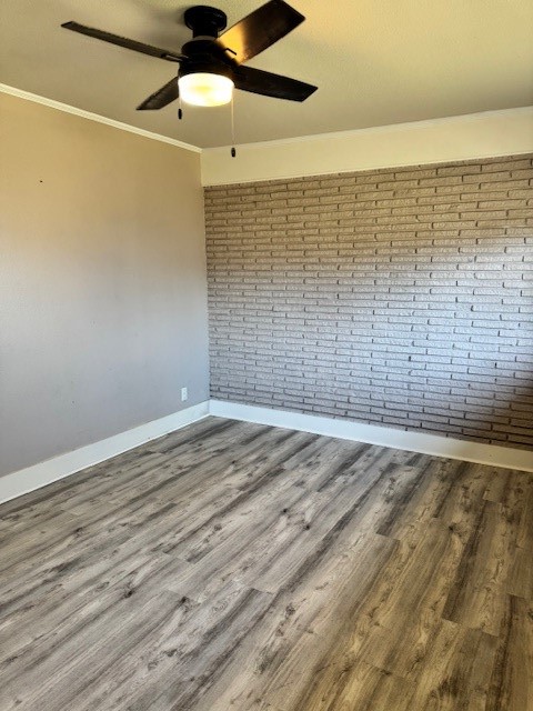 3500 Doris Street Bay City, TX 77414 - Photo 17 of 22 a view of empty room with wooden floor