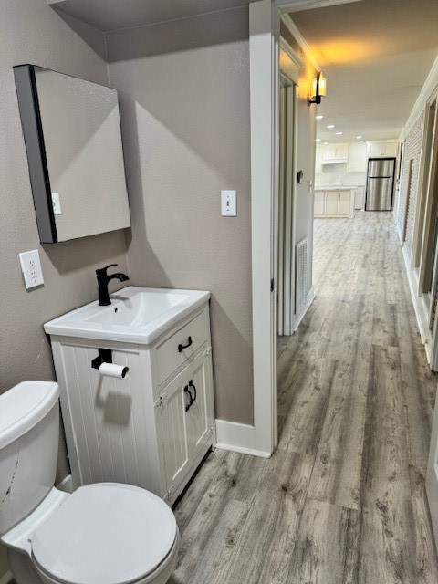 3500 Doris Street Bay City, TX 77414 - Photo 21 of 22 a bathroom with a toilet sink and mirror