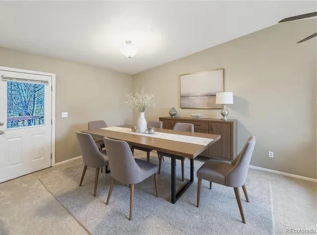 a view of a dining room with furniture