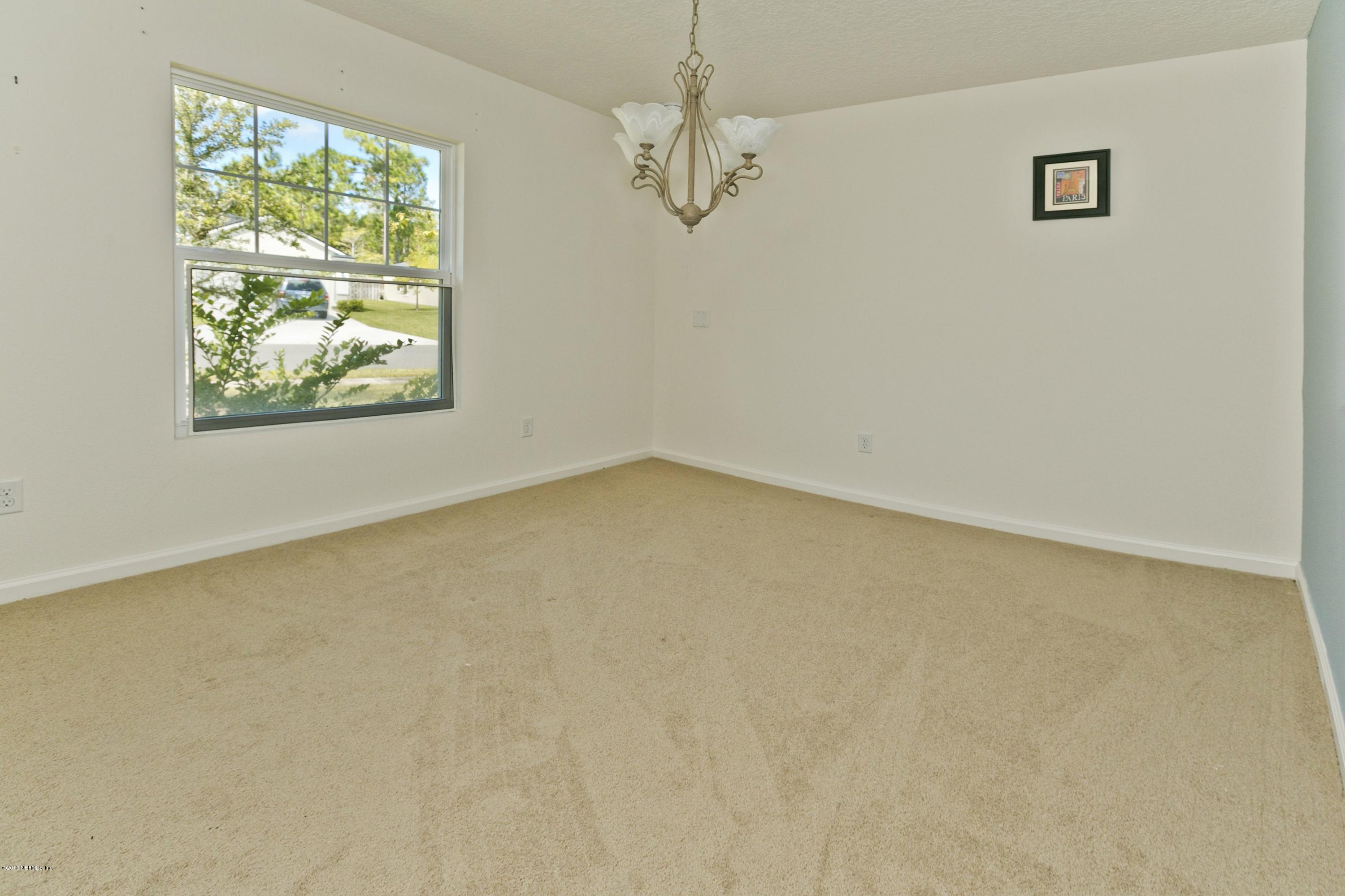 76 North Twin Maple Road St. Augustine, FL 32084 - Photo 12 of 21 an empty room with a window