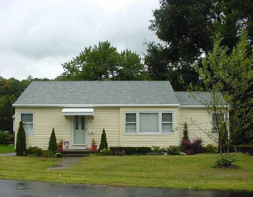 5 Underhill Road Ansonia, CT 06401 - Photo 1 of 1 a front view of a house with a yard
