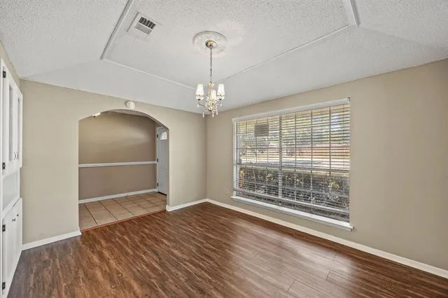 a view of livingroom with hardwood floor and window