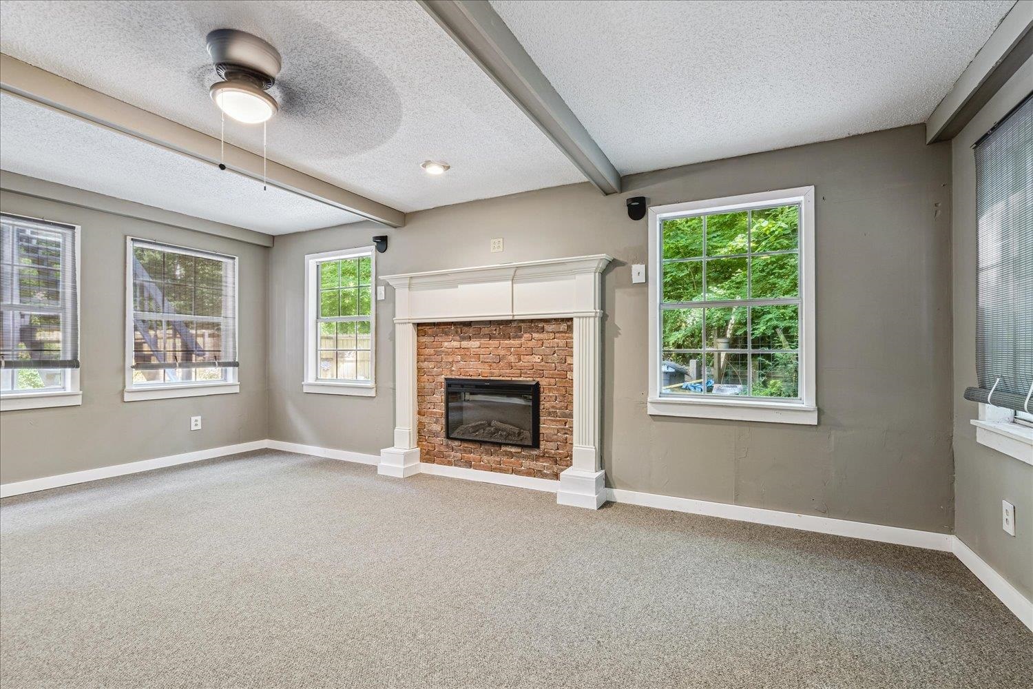 29 Claire Cove Ripley, TN 38063 - Photo 20 of 37 Located downstairs.New Carpet.Wood burning Fireplace.