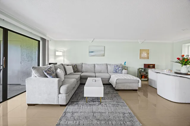 a kitchen with stainless steel appliances a refrigerator sink and cabinets