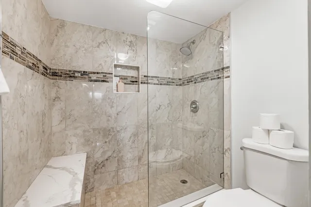 an aerial view of a city with lots of residential buildings