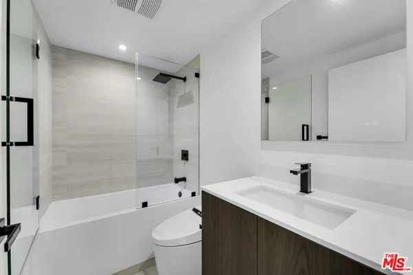 an aerial view of a building with a lot of city