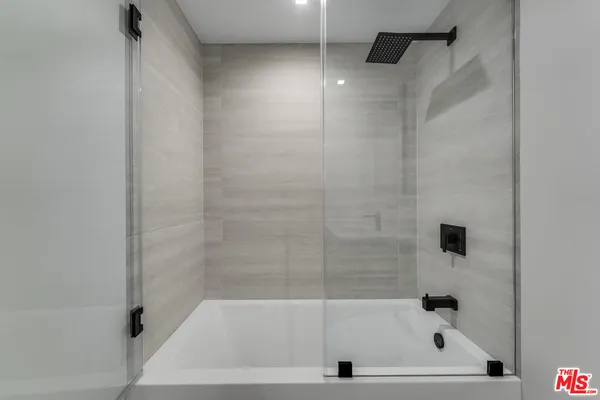 an aerial view of a building with a lot of city