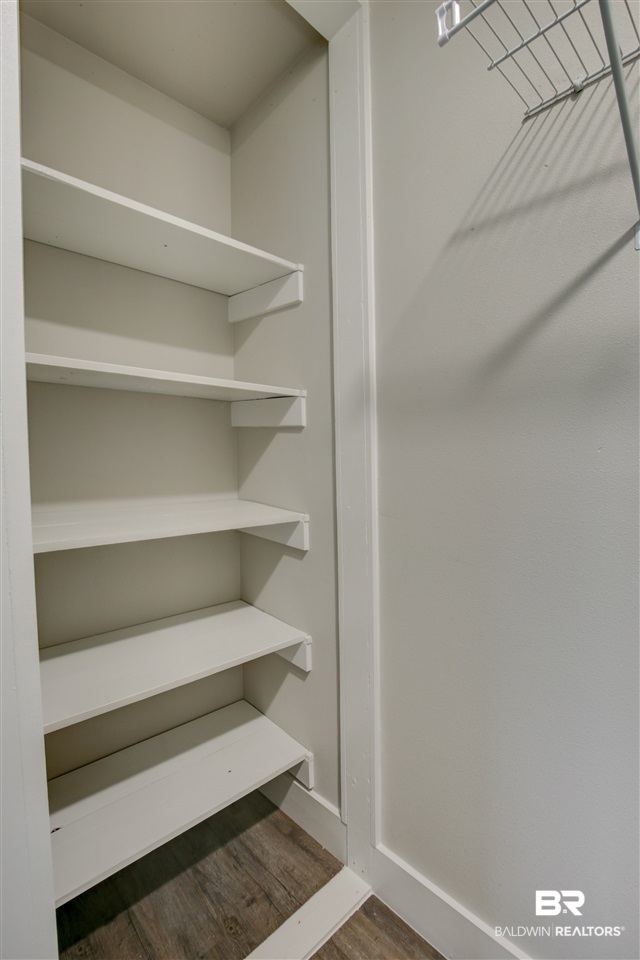9850 Twin Beech Road Fairhope, AL 36532 - Photo 13 of 26 antique wood shelves