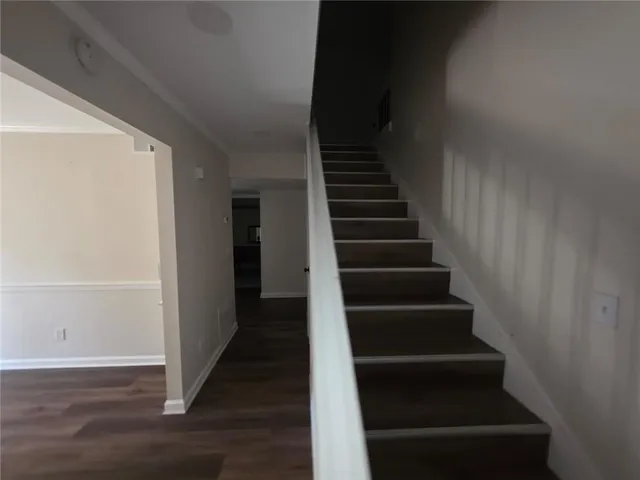a view of entryway with wooden floor