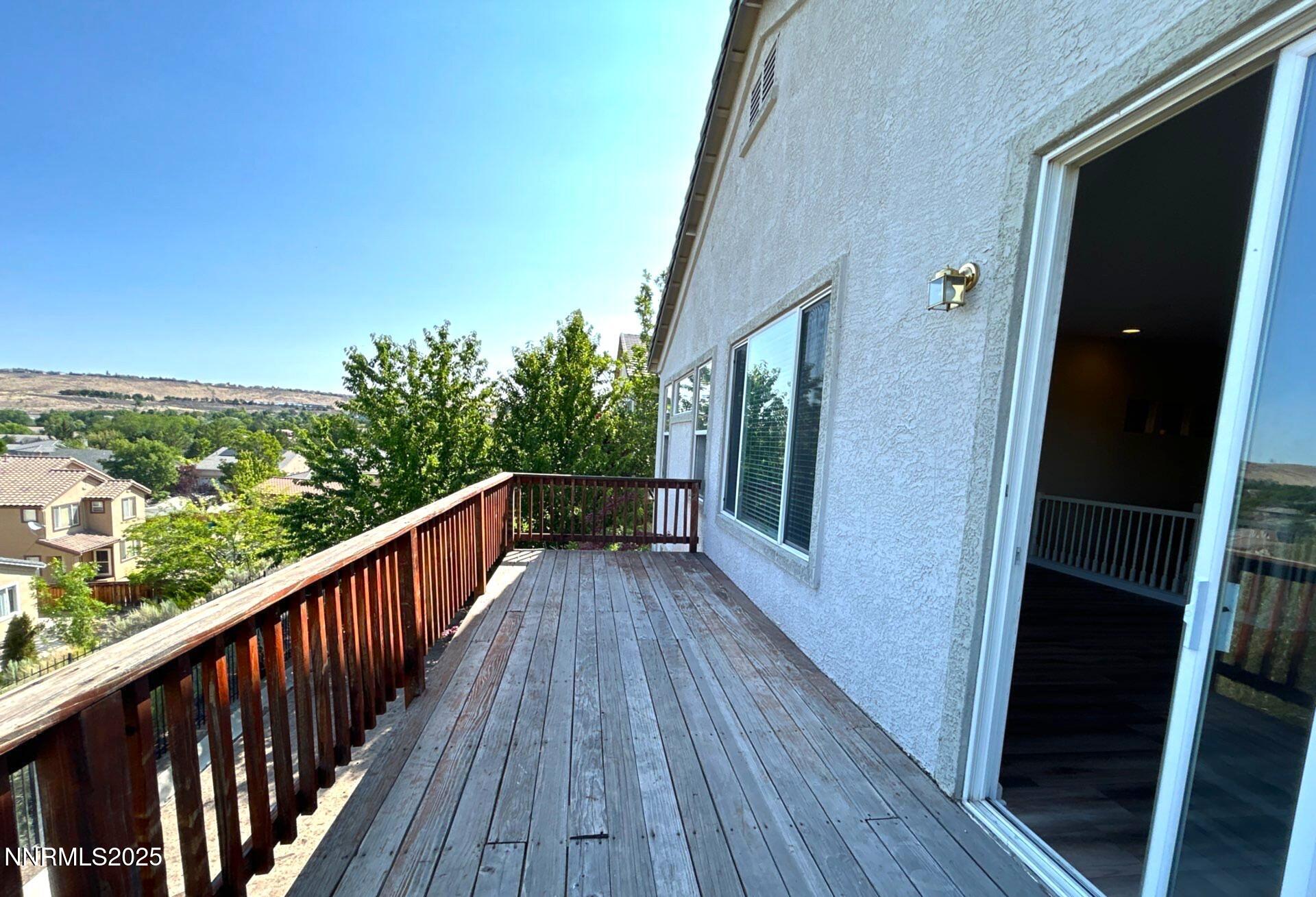 1484 Cloud Peak Drive Sparks, NV 89436 - Photo 16 of 16 a view of balcony with wooden floor