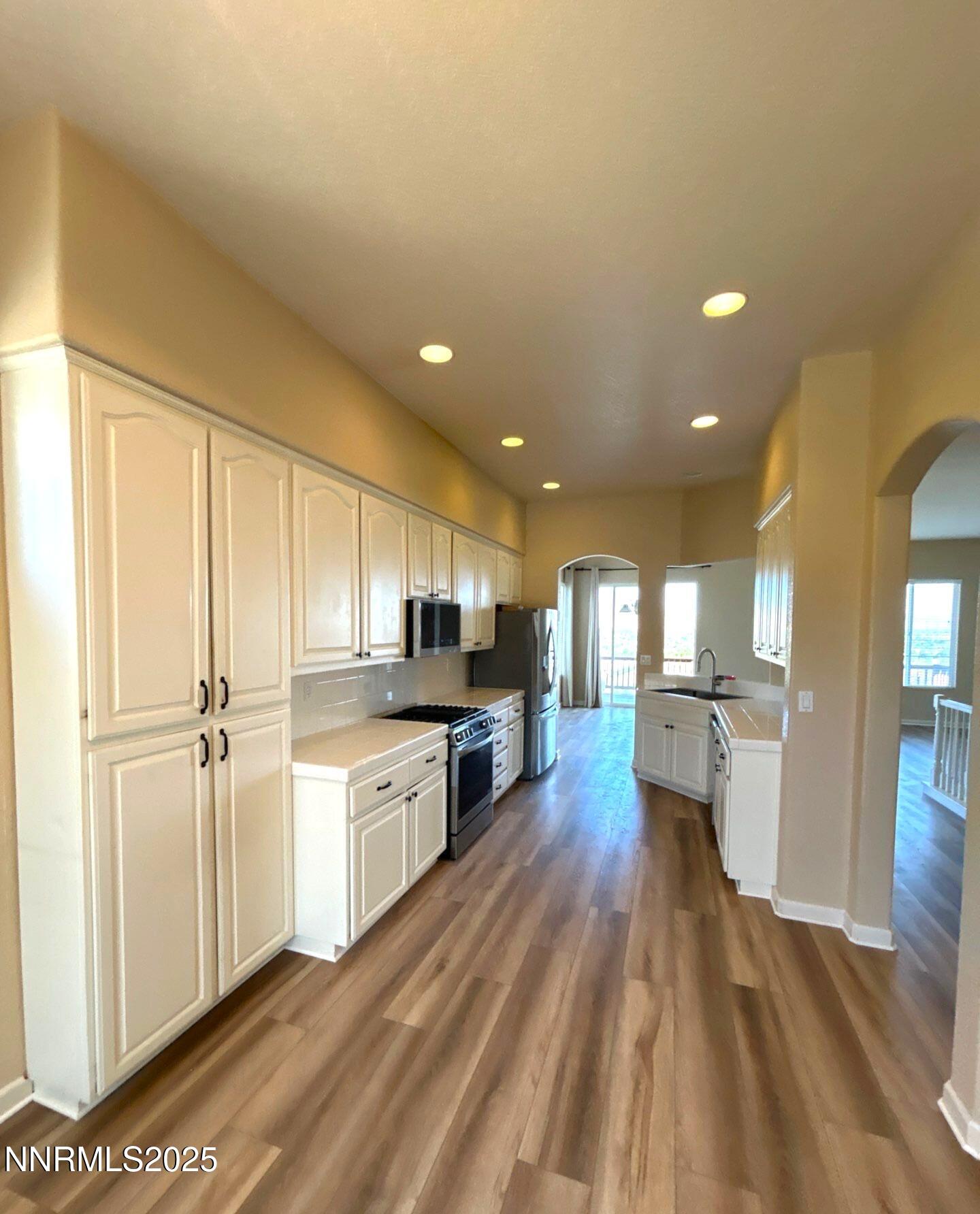1484 Cloud Peak Drive Sparks, NV 89436 - Photo 8 of 16 a large kitchen with a lot of counter space