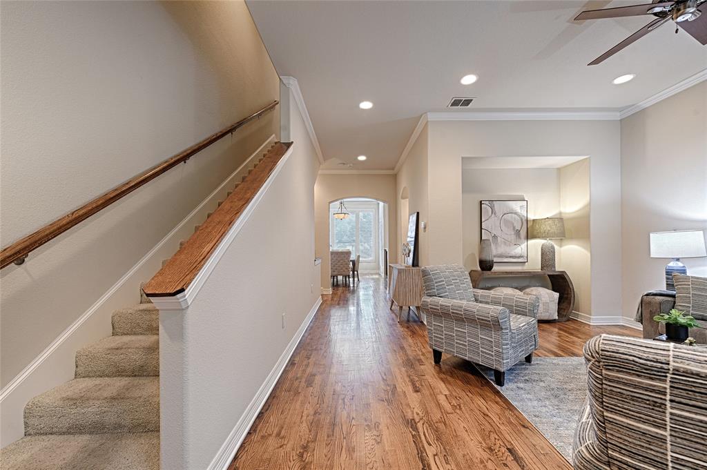6269 Oram Street, Unit 10 Dallas, TX 75214 - Photo 17 of 25 a living room with furniture and a wooden floor
