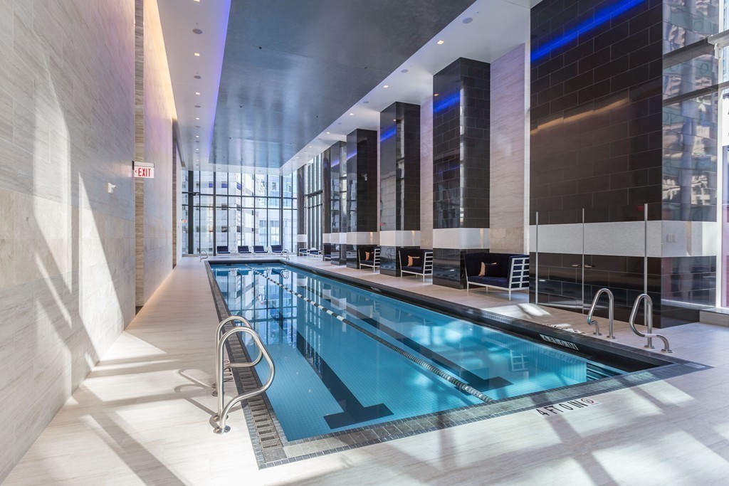 1 Franklin Street, Unit 1004 Boston, MA 02110 - Photo 21 of 24 a view of swimming pool with outdoor seating