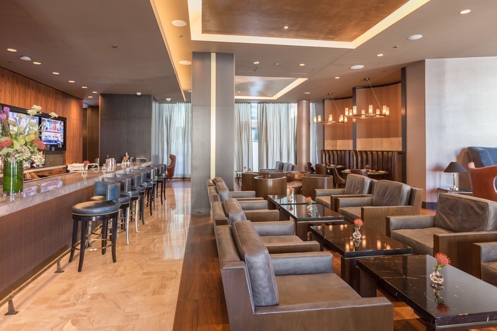 1 Franklin Street, Unit 1004 Boston, MA 02110 - Photo 23 of 24 a very nice looking living room with furniture and a large window