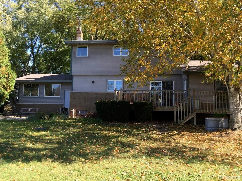 9623 Earhart Road South Lyon, MI 48178 - Photo 5 of 36 rear.JPG