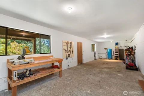 a view of balcony with wooden floor and fence