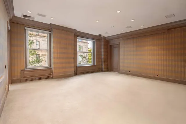 an empty room with windows