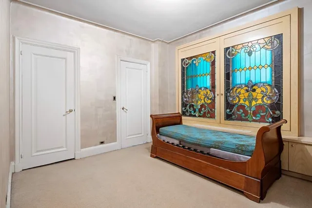 a room with furniture and window