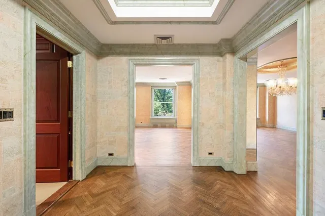 a view of a garden with an outdoor seating