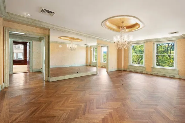 a view of an entryway with a chandelier