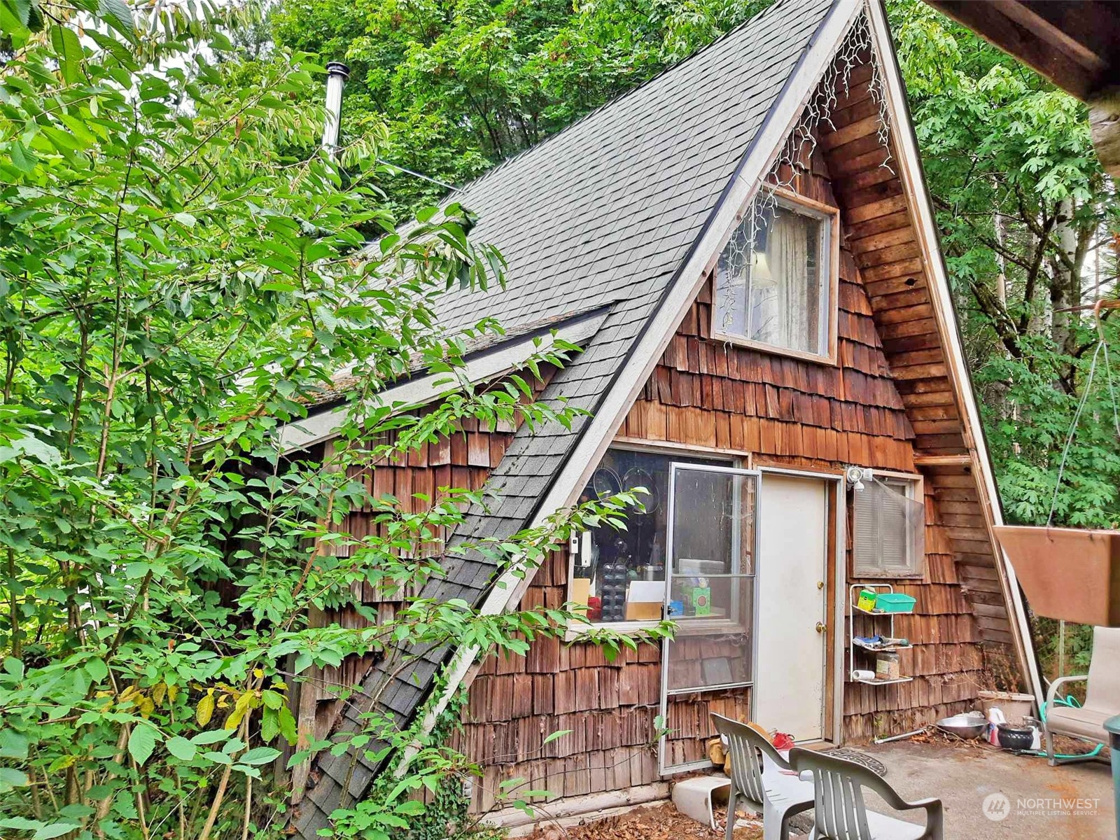 10 McKee Road Quilcene, WA 98376 - Photo 1 of 34 a view of house with yard and staircase