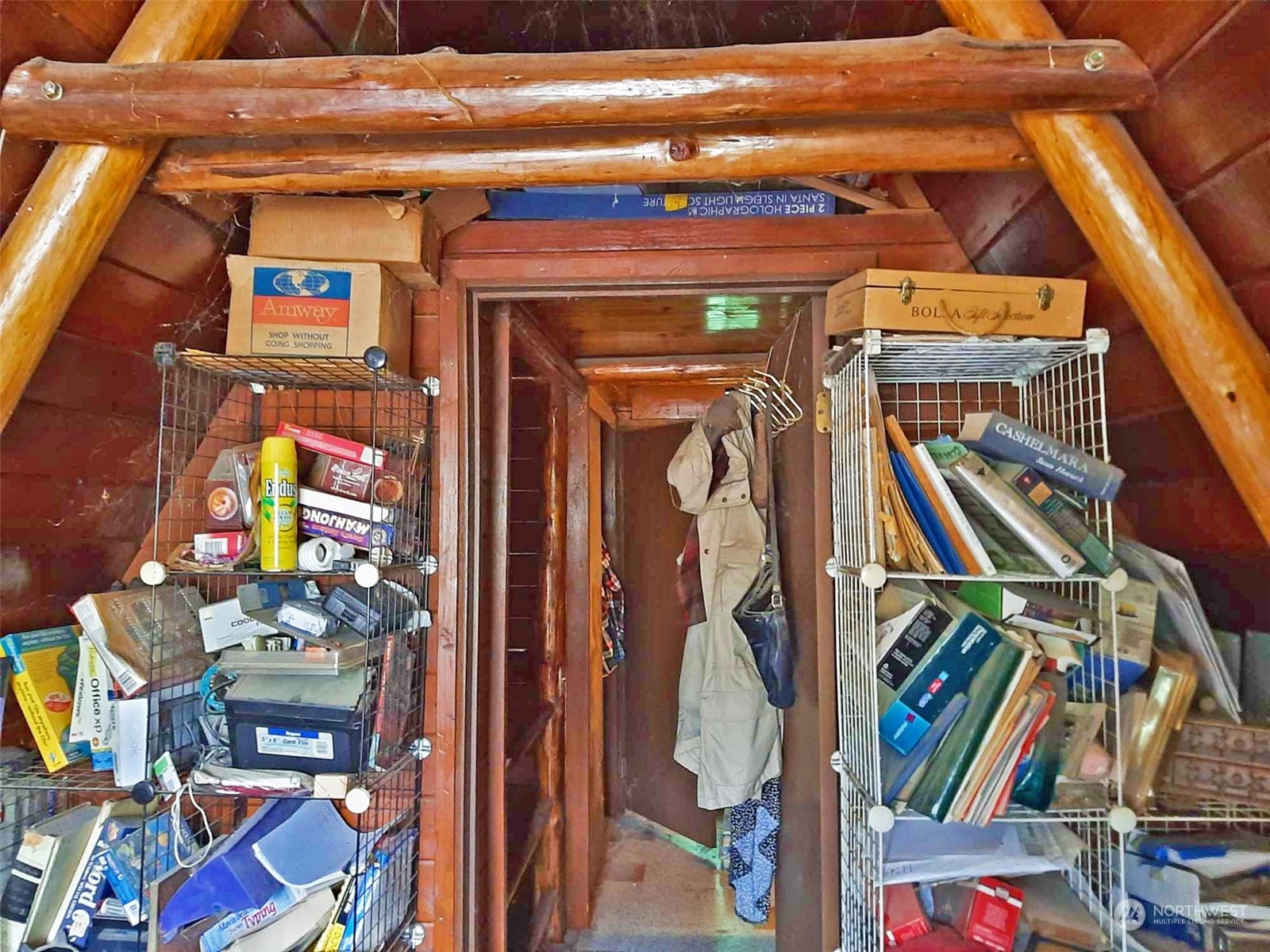 10 McKee Road Quilcene, WA 98376 - Photo 20 of 34 a view of walk in closet with clothes and shoes