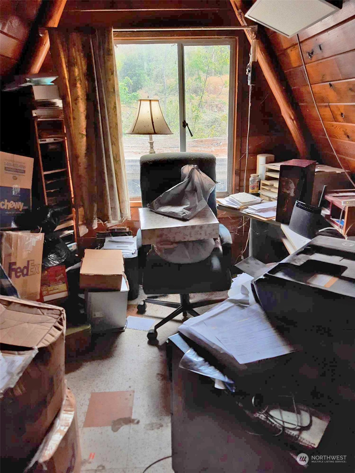 10 McKee Road Quilcene, WA 98376 - Photo 22 of 34 a living room with furniture and a fireplace