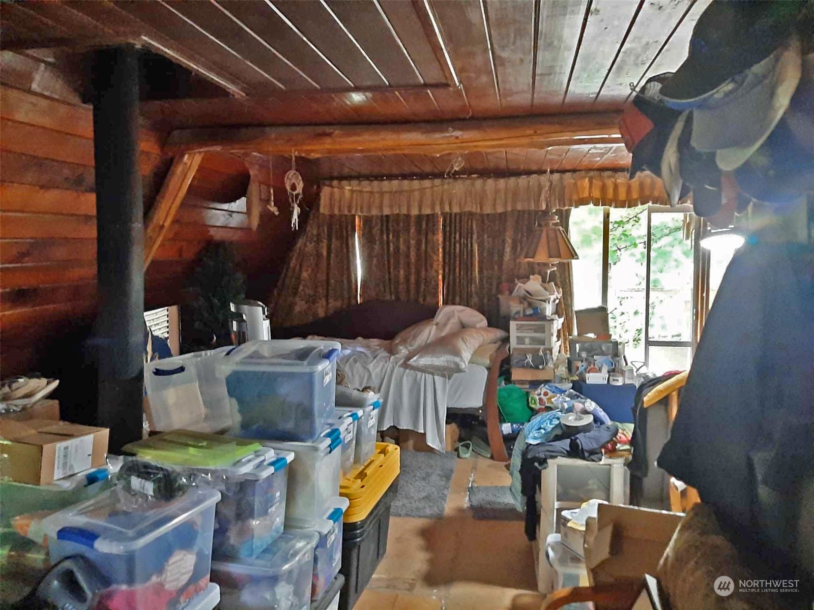 10 McKee Road Quilcene, WA 98376 - Photo 7 of 34 a living room with furniture and a window