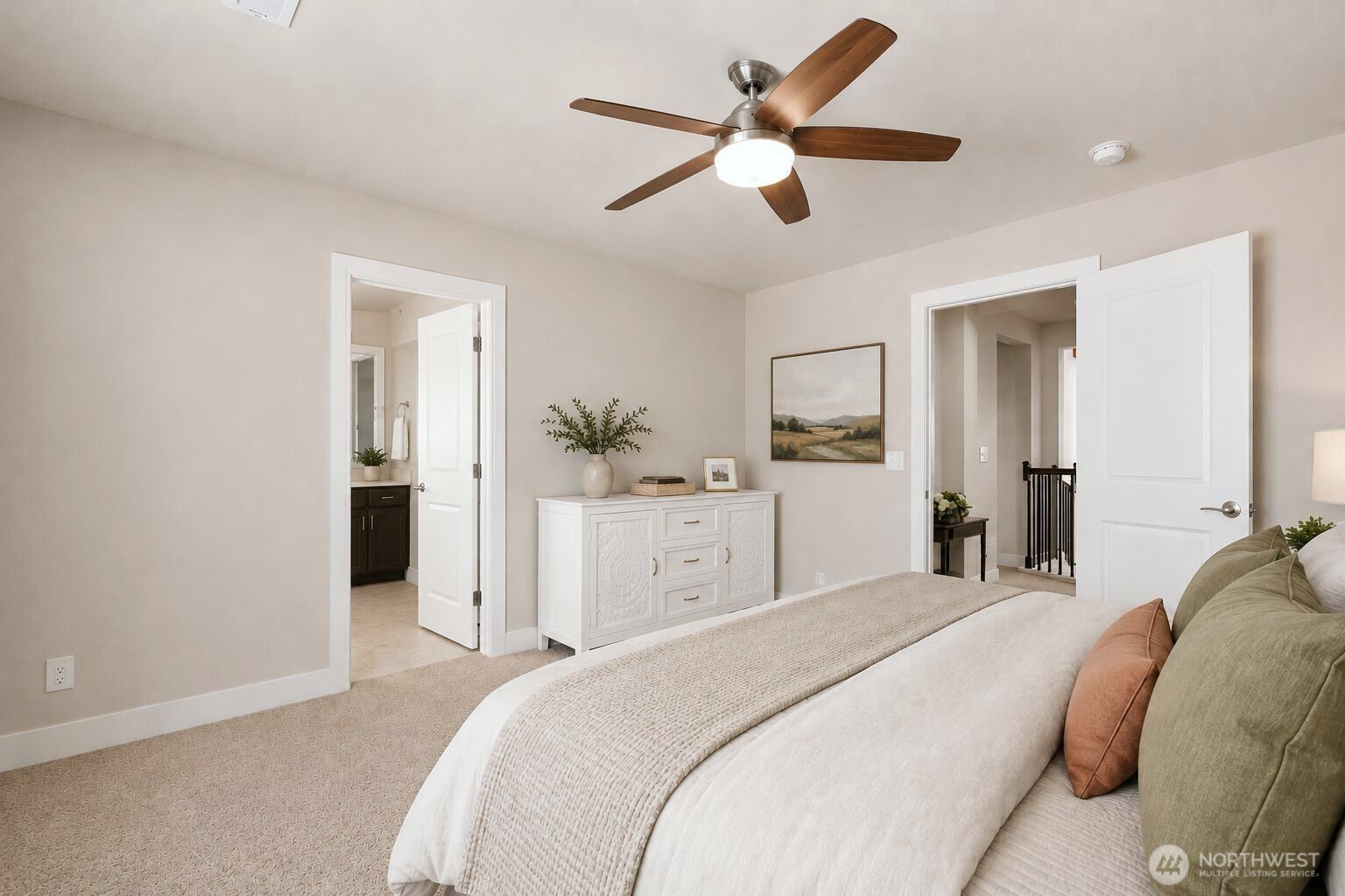 19607 25th Drive Southeast Bothell, WA 98012 - Photo 15 of 30 a bedroom with a large bed and a chandelier