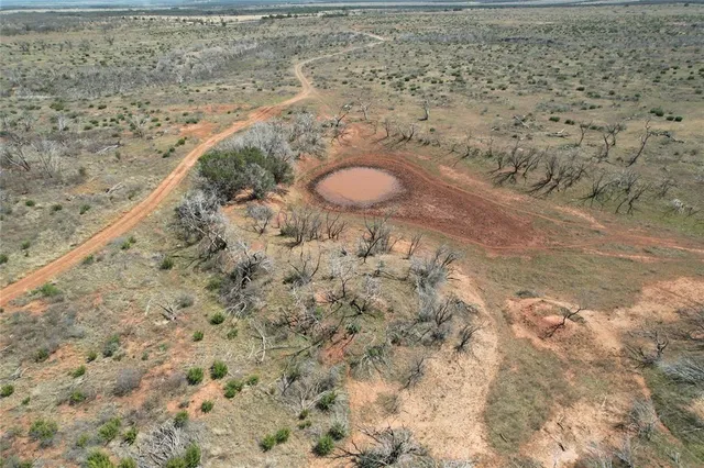 a view of a backyard of a house