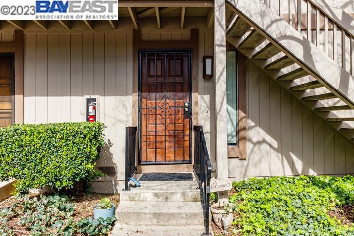 a house with trees in front of it