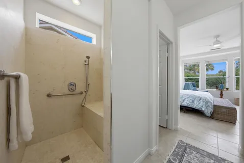 a en suite bathroom with a sink and a shower