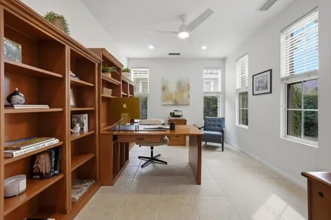 a view of a workspace with furniture