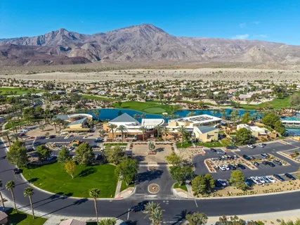 an aerial view of residential houses and outdoor space
