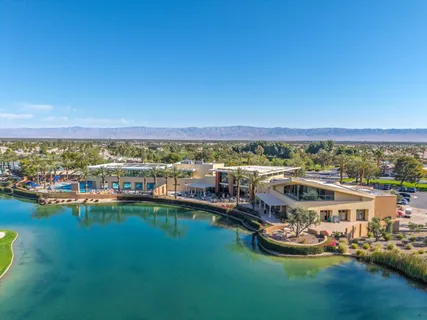a view of a city with lawn chairs
