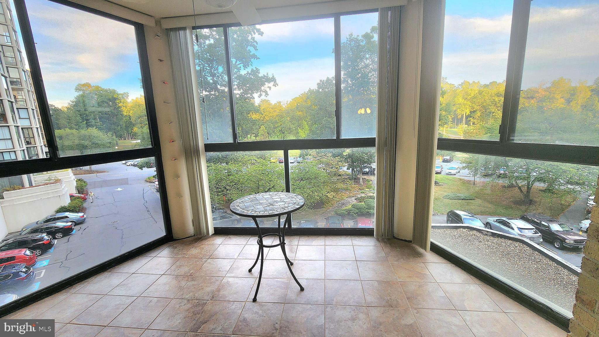 15101 Interlachen Drive, Unit 1315 Silver Spring, MD 20906 - Photo 2 of 37 Glass-enclosed balcony