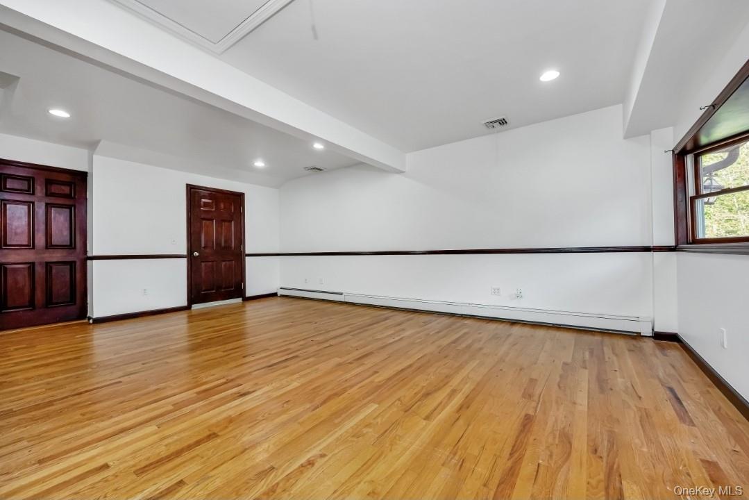 31 Fuller Avenue West Babylon, NY 11704 - Photo 10 of 33 a view of a room with wooden floor