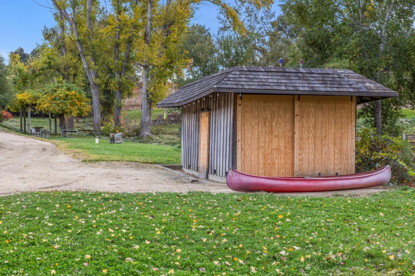 18190 Cachagua Road Carmel Valley, CA 93924 - Photo 11 of 35 a view of a wooden house with a yard