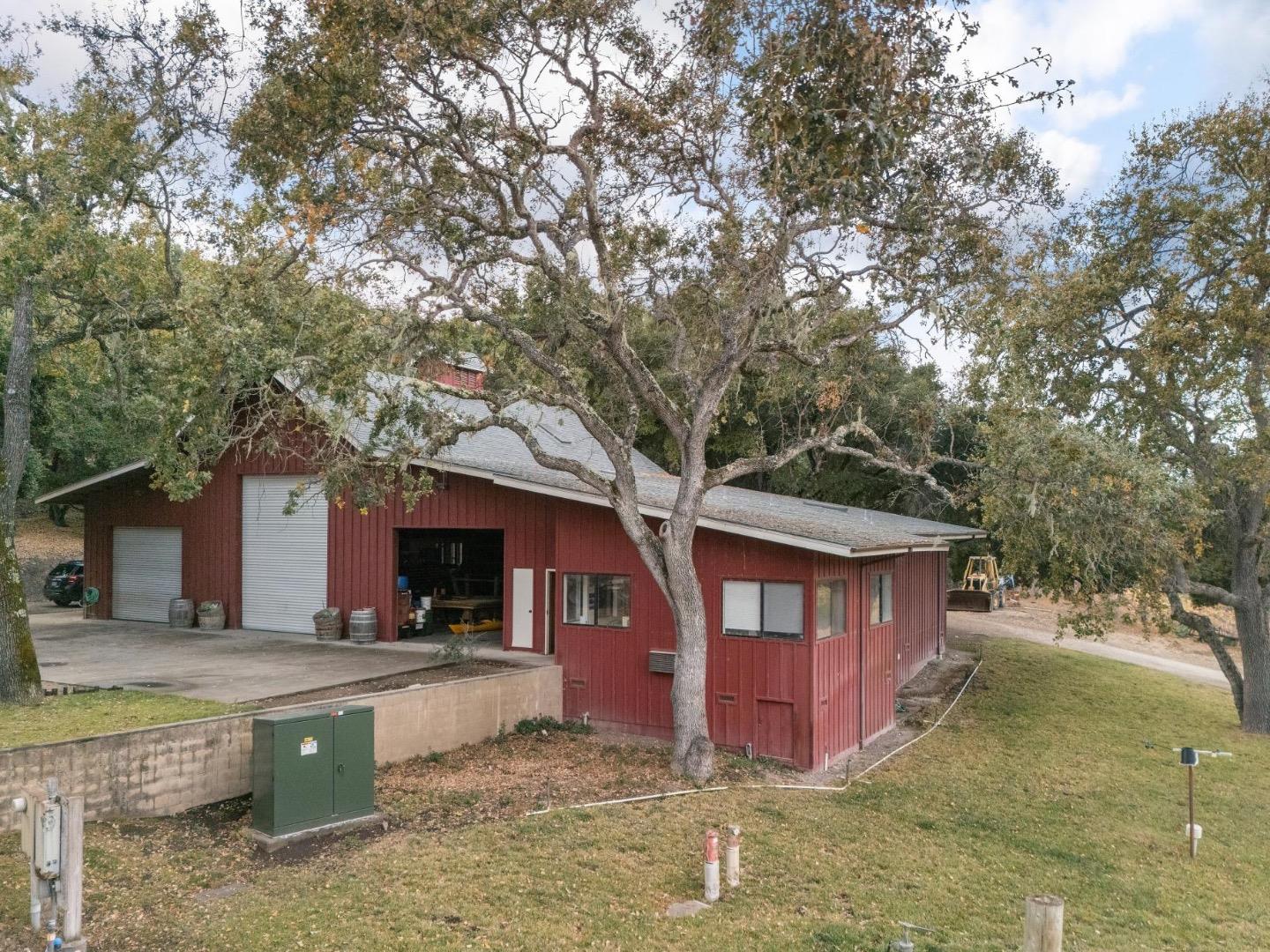 18190 Cachagua Road Carmel Valley, CA 93924 - Photo 19 of 35 a view of a small house with yard