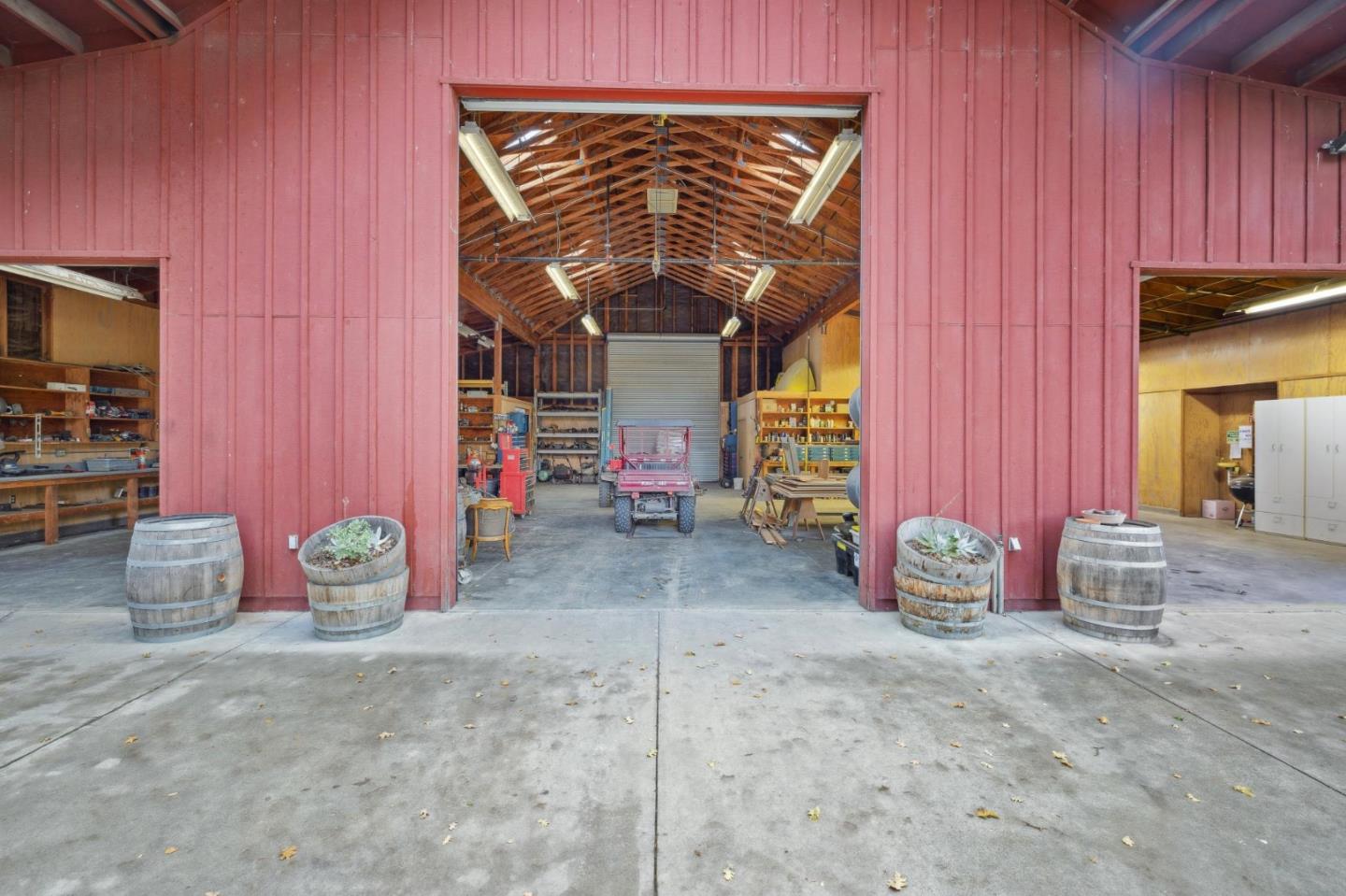 18190 Cachagua Road Carmel Valley, CA 93924 - Photo 22 of 35 a view of a room with wooden shelves