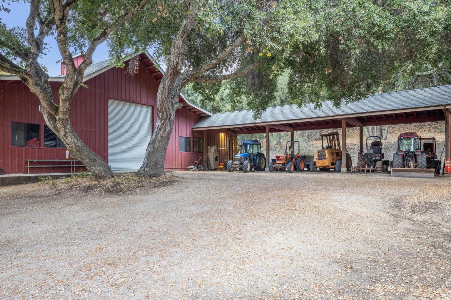 18190 Cachagua Road Carmel Valley, CA 93924 - Photo 24 of 35 a front view of a house with lots of green space