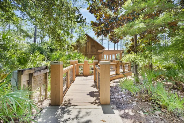 a view of a house with a deck and a patio