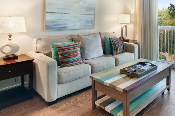 a living room with furniture and a window