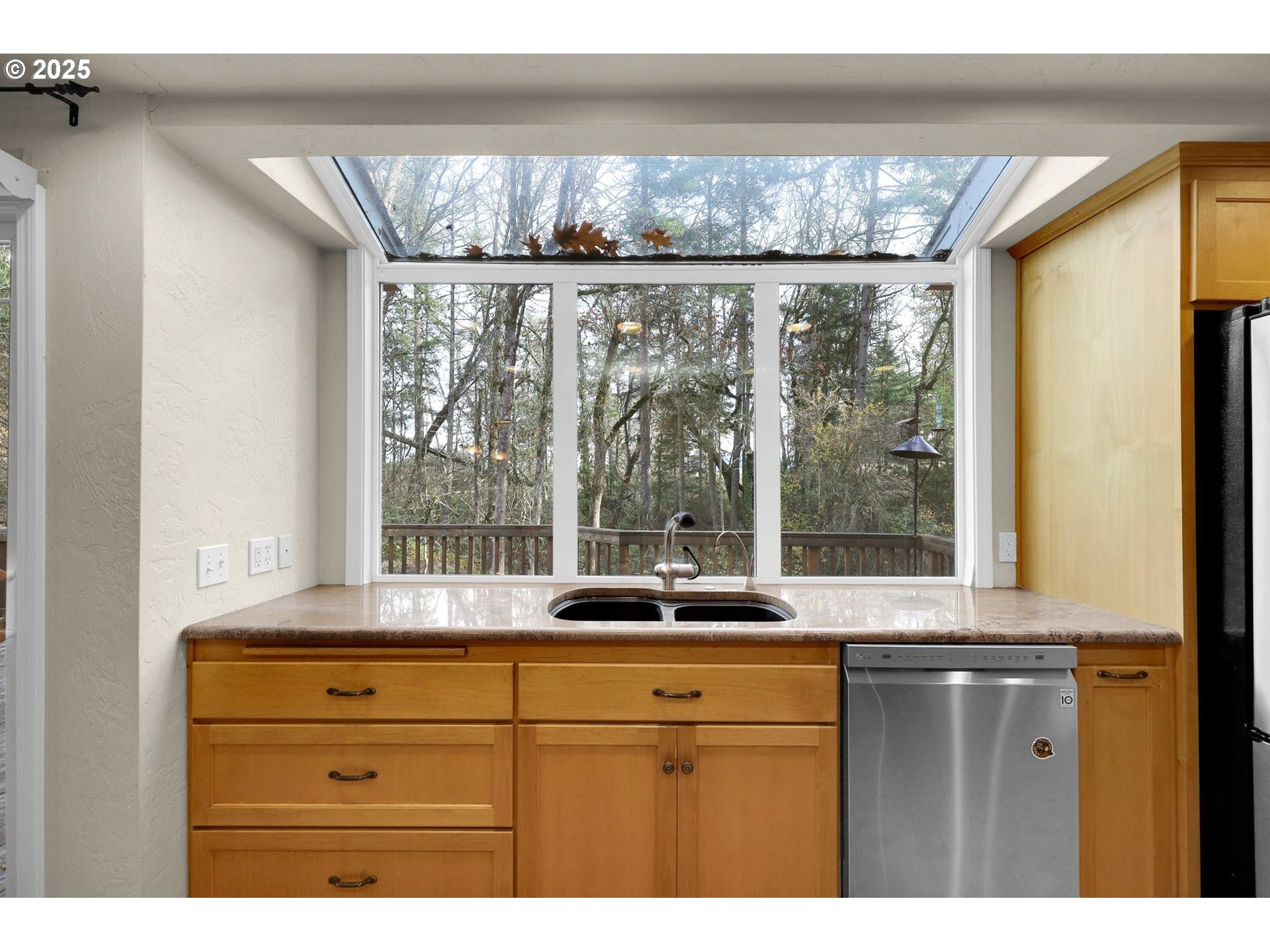 4103 Brae Burn Drive Eugene, OR 97405 - Photo 13 of 22 a sink with a window and outdoor kitchen